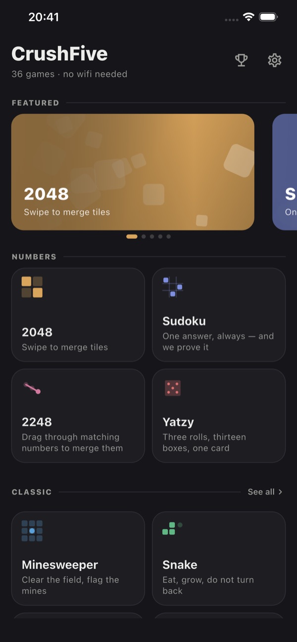 The CrushFive home screen: featured games and a grid of game cards